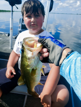 My Grandson Lincoln with a 4 pound Largemouth